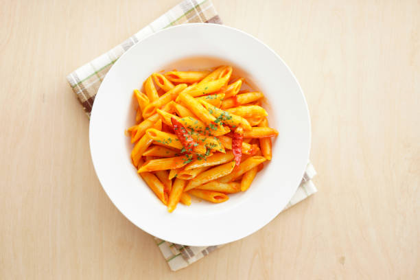istock Pasta pens in angry sauce. 1134661577