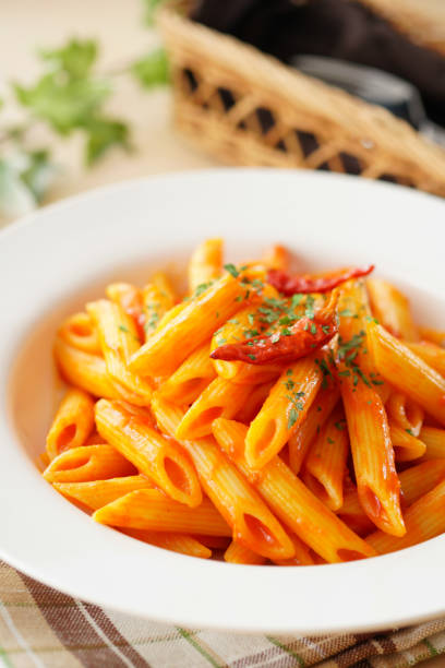 istock Pasta pens in angry sauce. 1134661735