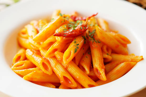 istock Pasta pens in angry sauce. 1134661871