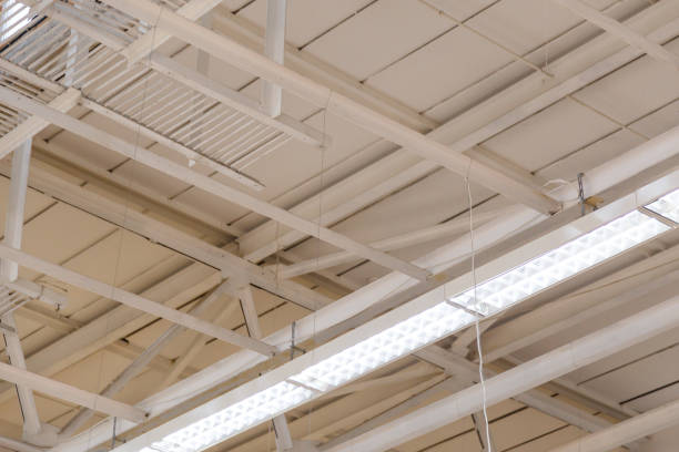 istock Suspended ceiling lamps for industrial building lighting 1134663920