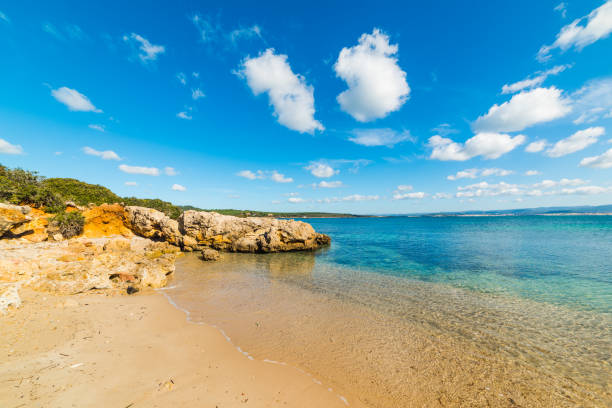 istock Sandy shore with rocks in a small cove in Alghero 1134665070