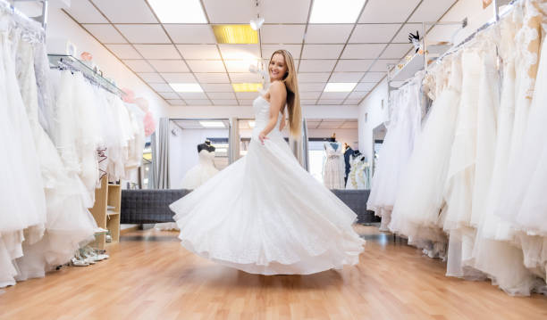 istock Young bride dancing in bridal shop 1134667985