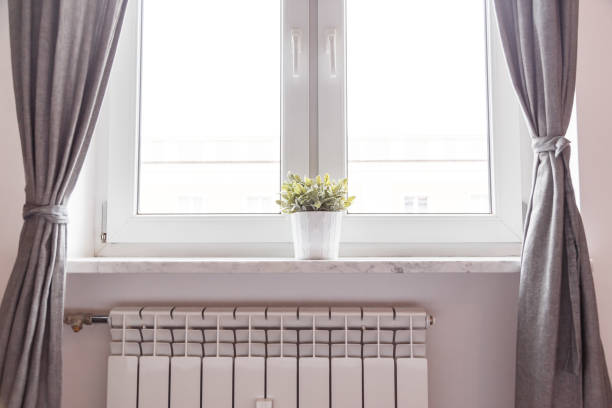 istock Window and radiator in room 1134669854