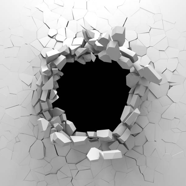 istock Dark destruction cracked hole in white stone wall 1134669972
