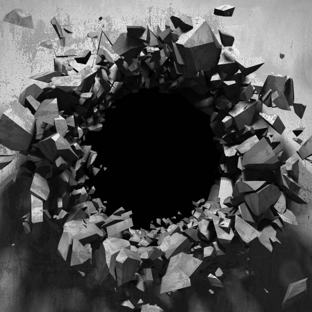 istock Dark cracked broken hole in concrete wall 1134671110