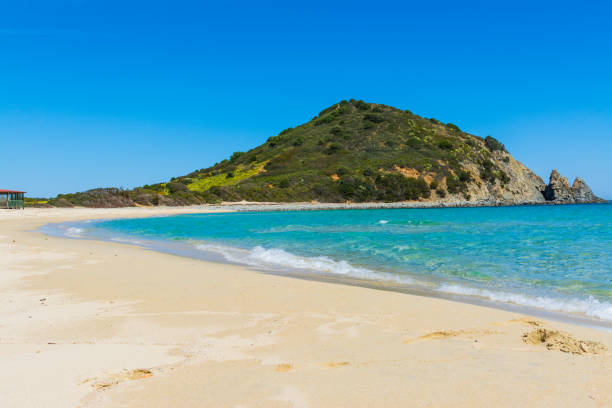 istock Cala Monte Turno sandy shore on a clear day 1134673171