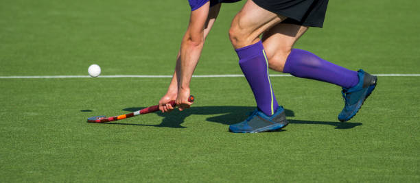 istock Low Section Of Man Playing Hockey On Turf 1134674674