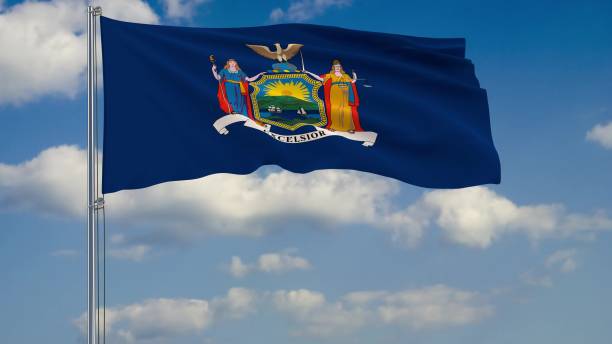istock Flag of New York - US state fluttering in the wind against a cloudy sky 3d rendering 1134677049