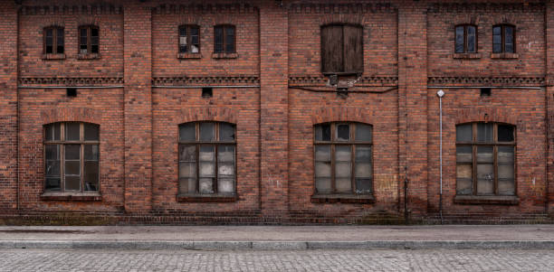 Old, empty industrial background Panoramic old, grunge, abandoned urban/ industrial background with copy space city street stock pictures, royalty-free photos & images