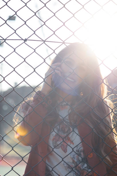 istock Beautiful young womanusing smartphone 1134680798