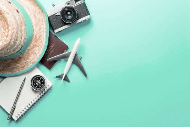 istock Summer Travel accessories on teal background copy space 1134680801