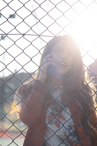 istock Beautiful young womanusing smartphone 1134680804