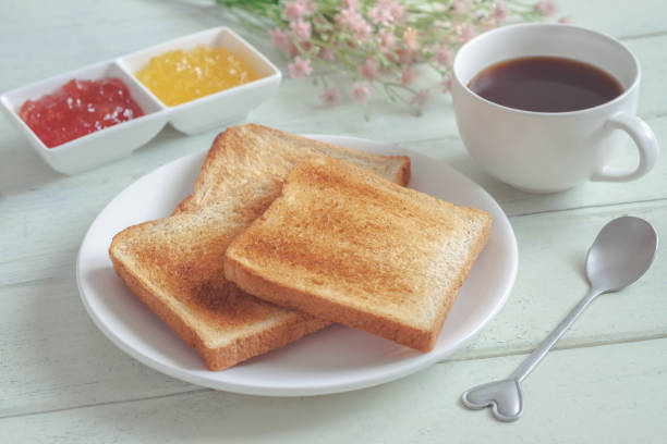 istock Toast bread on plate with jam and coffee cup 1134682722