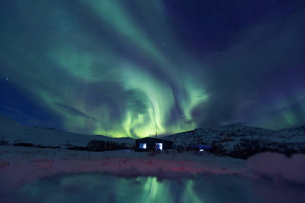 Northern Lights or Aurora Borealis. Kola Peninsula winter landscape