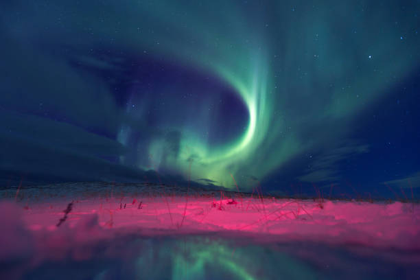 Northern Lights or Aurora Borealis. Kola Peninsula winter landscape