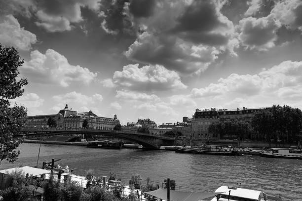 istock Clouds over world famous Seine river in Paris 1134686499
