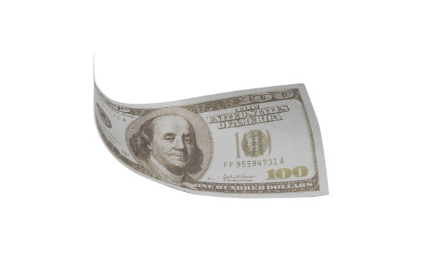 istock Flying money isolated on white background 1134686649
