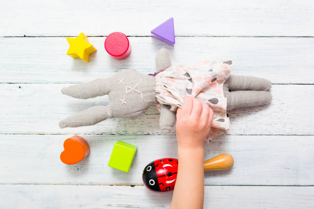 istock Baby hand and toys 1134686769