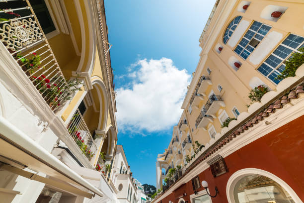 Luxury buildings in famous via Camerelle in Capri Luxury buildings in famous via Camerelle in Capri, Italy table ledge stock pictures, royalty-free photos & images