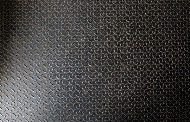 istock Metal floor plate with diamond steel pattern, metal sheet texture background. 1134690965