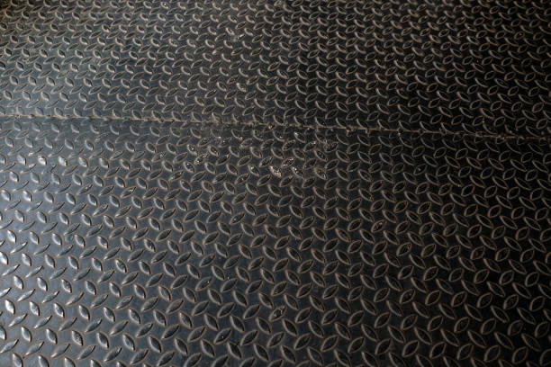 istock Metal floor plate with diamond steel pattern, metal sheet texture background. 1134690971