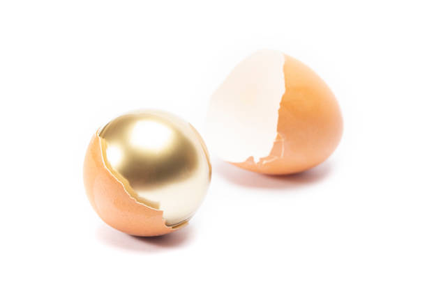 istock An egg cracked and have golden sphere inside 1134693555