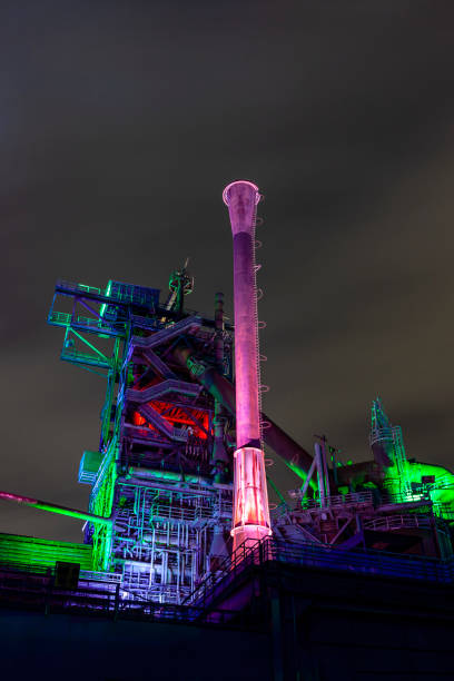 istock Old factory building illuminated at night 1134698482