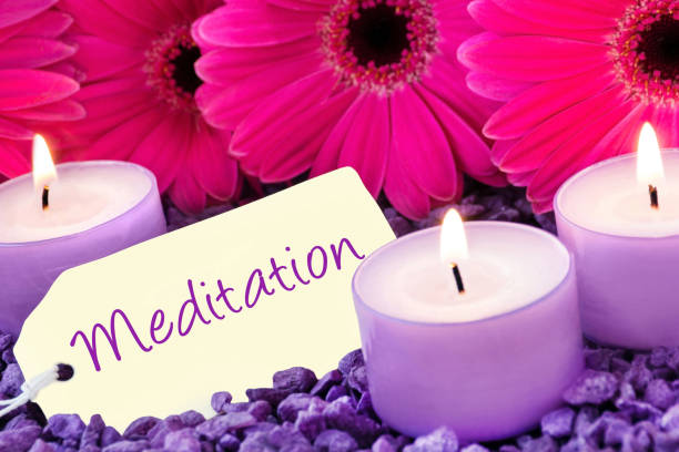 istock Meditation label and candles with flowers 1134699123