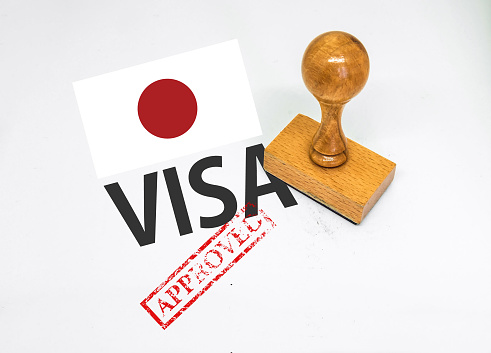 Japan Visa Approved with Rubber Stamp and flag