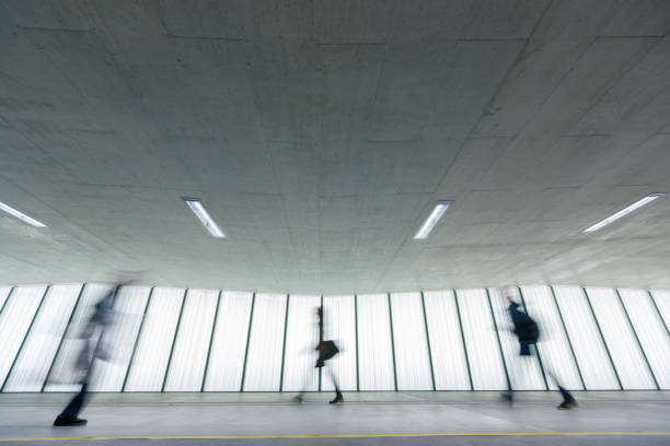 istock Motion blurred people - figures in an underpassage getting to their workplace in the morning 1134701408