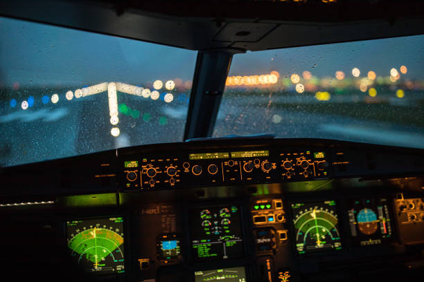 pilot's hand accelerating on the throttle in  a commercial airliner airplane flight cockpit during takeoff - airplane cockpit taking off pilot imagens e fotografias de stock