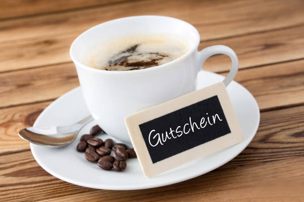 istock German coffee time coupon and wooden background 1134702170