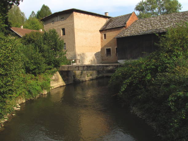 istock Old water saw with millrace near the river 1134703383