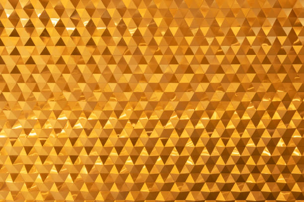 Abstract background from golden brick decorated on wall. Modern wallpaper.