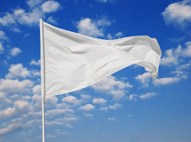istock White flag against the blue sky 1134707295