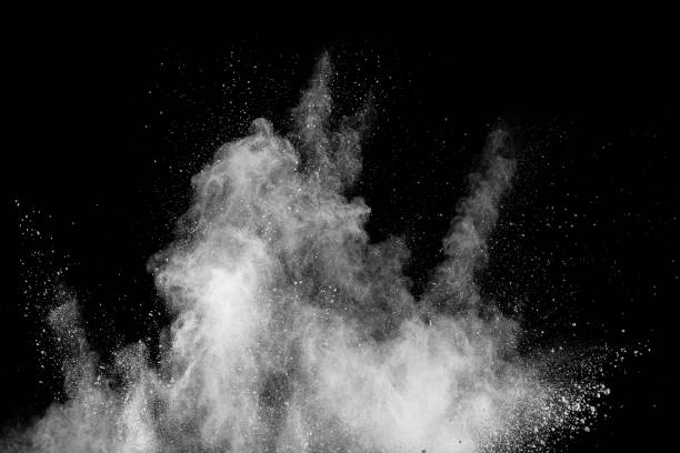 istock White powder explosion isolated on black background. White dust particles splash.Color Holi Festival. 1134707623