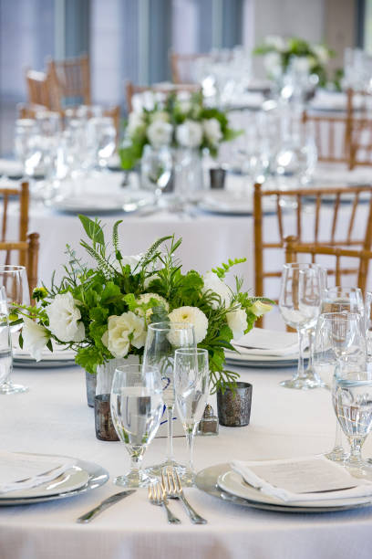 istock wedding table set for fine dining at a fancy catered event - wedding table series 1134707755