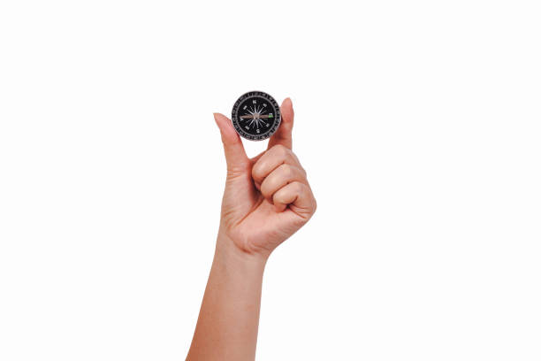 istock Old Vintage compass in hand for travel navigation . 1134707786