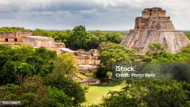 A Beautiful View Of The Pyramid Of The Magician In The Mayan Archaeological Site Of Uxmal In The Yucatan In Mexico Stock Photo - Download Image Now