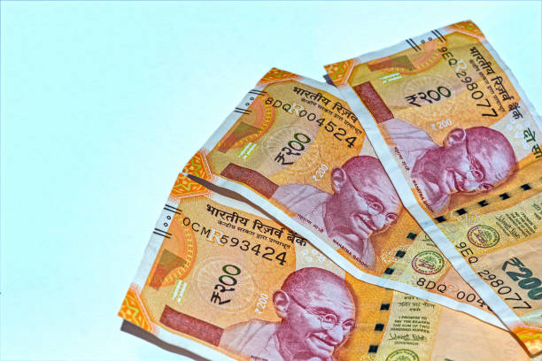 istock New 200 rupees Indian currency on white background with copy space. 1134709533