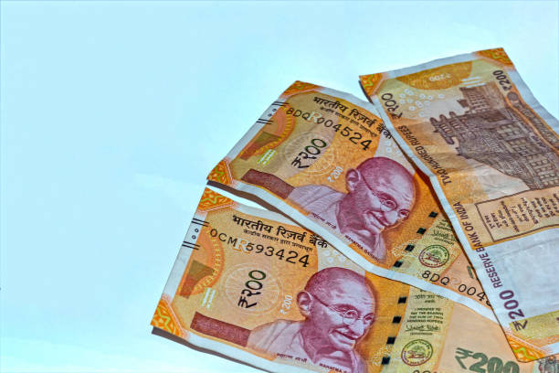 istock New 200 rupees Indian currency on white background. 1134709619