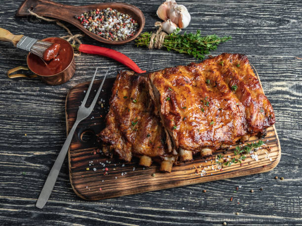 istock grilled pork ribs with sauce on a cutting board , spice, marinade 1134709622