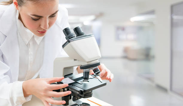 istock Scientist researcher using microscope in laboratory. Medical healthcare technology and pharmaceutical research and development concept. 1134709641