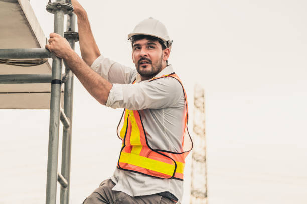 istock Young man construction worker or engineer climb ladder on the building top. Engineering project concept. 1134709676