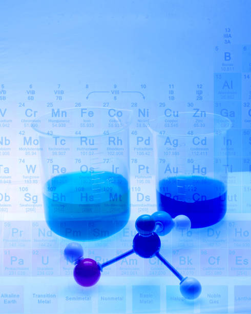 istock Periodic table of atomic elements with beakers and a molecular model. 1134711322