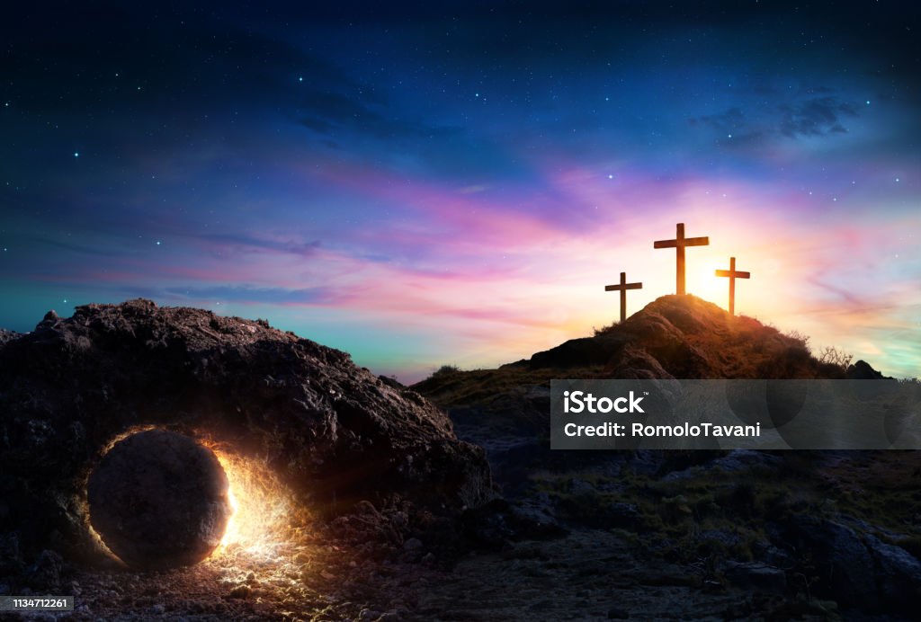 Resurrection - Tomb Empty With Crucifixion At Sunrise Crosses And Empty Tomb of Jesus Christ Easter Stock Photo