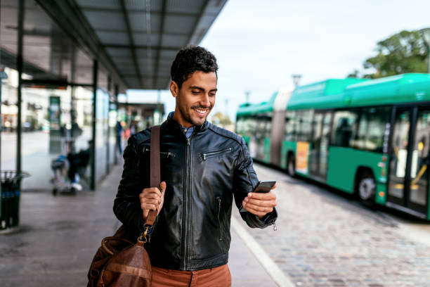 istock Brazilian / Latinx millennial man commuting to work and using mobile app 1134712391