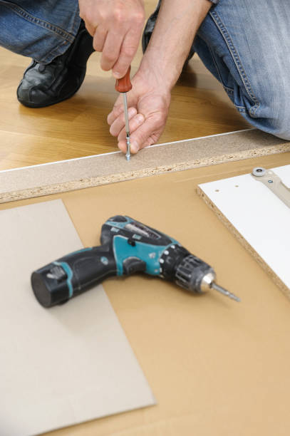 istock A man is assembling the furniture at home. 1134714287