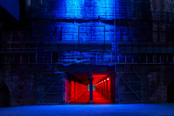 istock Old industrial building illuminated at night 1134715252