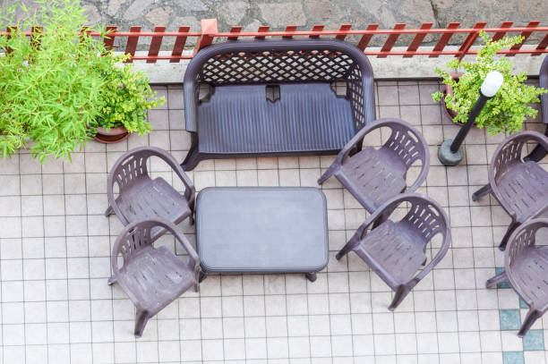 istock table and garden chair from above . Sunny patio with table and chairs, high angle view 1134720179